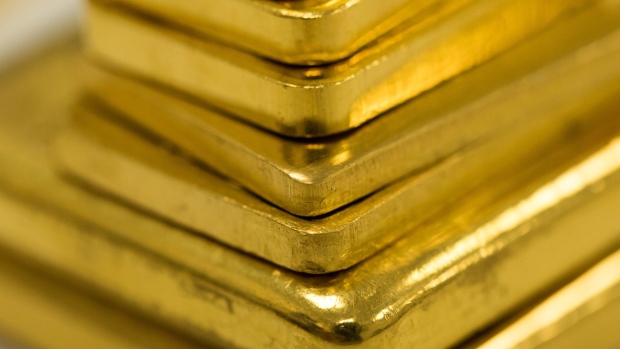 A selection of gold bars of various weights sit at Gold Investments Ltd. bullion dealers in this arranged photograph in London, U.K., on Wednesday, July 29, 2020. Gold held its ground after a record-setting rally as investors awaited the outcome of a Federal Reserve meeting amid expectations policy makers will remain dovish, potentially spurring more gains.