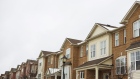 Homes in Georgetown, Ontario, Canada, on Friday, March 3, 2023. Younger generations and recent arrivals are more likely to be carrying heavy debt loads or have taken out large adjustable-rate mortgages to finance expensive homes during the Covid-19 real estate boom.