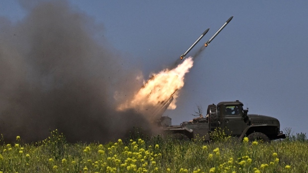 A rocket launcher fires towards Russian positions at a front line near Bakhmut on June 20. Photographer: Genya Savilov/AFP/Getty Images