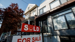 Sold sign by a Toronto house